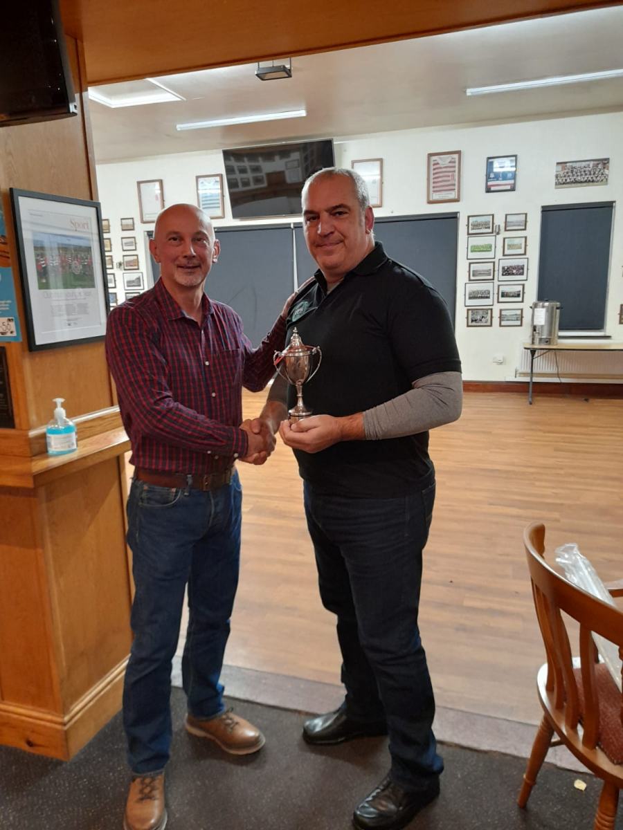 Chair-handing-out-contribution-award